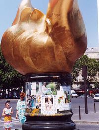 The Flame of Liberty, which sits above the entrance to the Paris tunnel in which Diana died. The public fly-posted the base with commemorative material for several years. This material has since been removed by the French authorities.